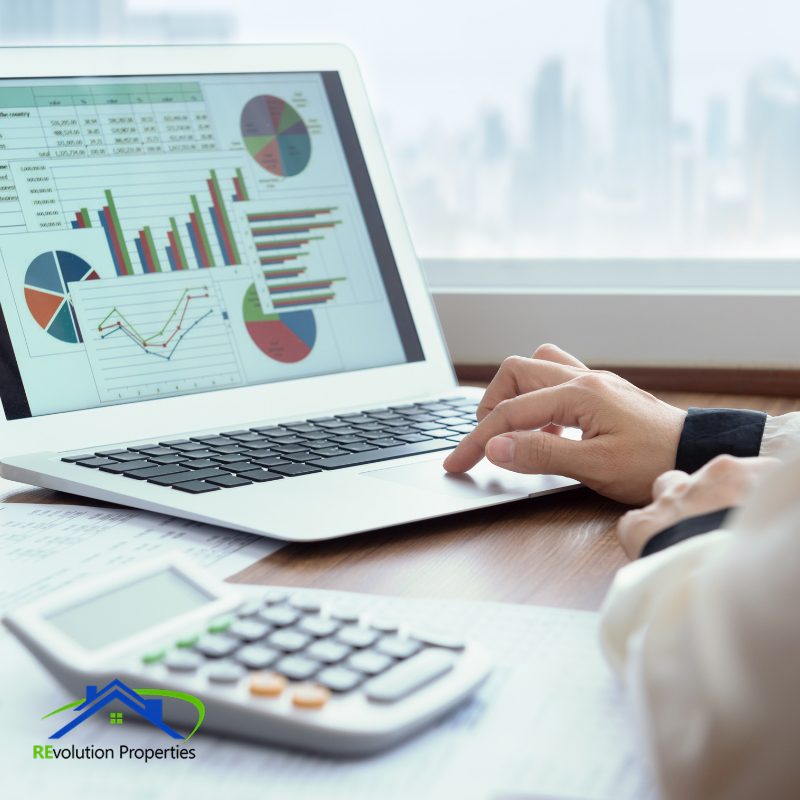 rent Financials Property manager Property manager reviewing rental income and expense reports on laptop
